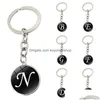 Porte-clés Pendentif boule de verre de mode Porte-clés Dainty Initial Lettre personnalisée Nom Chaîne pour femmes et hommes Bijoux Accessoires Gi Dhjqk