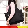 Bolsas de lona Bolsa de viaje de gran capacidad Tota impermeable para mujeres Duffle de fin de semana Sport Solid Color Storage Homodos de hombro Q57