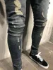 Herr jeans spring långa smala blyertsbyxor rippade hål 2023 herr mode tunna mager för män hiphop byxor kläder kläder