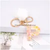 Keychains Bedanyards fofos pompom faux coelho peles glitter 26 letras key flor anéis de correntes acessórios de bolsa de joias gi dhf9k