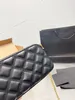 Deri bahar kamera çantası denim tasarımcı omuz çantası lüks çanta çapraz kanatlı çanta çanta moda çanta zinciri zil desenli mat kumaş