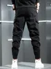 Мужские брюки черные осенние грузоподъемники мужская уличная одежда хип -хоп мужская шнурки для шнурки бегают брюки для брюки.