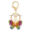 Anelli chiave Crystal Colorf Butterfly Keechcly Sinestone Borsa Porta della catena per auto Porta decorativa Keyrings Trendy Vintage Keyring D Dh9xr