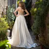 Robe de mariée élégante Satin Sexy col rond A-ligne dentelle Appliques mancherons côté fendu Illusion dos avec bouton robe de mariée