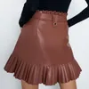 Kjolar kvinnor mode små veckade faux läder kjol pu halv fast färg fransad kort med bälte elegant mini