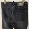 Mäns jeans designer nya män ljusblå elastisk sandtvättade jeans med små fötter DG66
