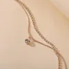 Bracelets de cheville créatifs Double couche incrustés de cristal, chaîne en os de serpent Simple couleur or réglable plage pieds nus bijoux de cheville