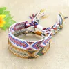 Bracciale intrecciato per ragazza Donna Corda fatta a mano Colore colpito Modello di vento esotico Bracciale arcobaleno Bracciale dell'amicizia fortunato