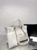 Luxury designer womens bag twist bag travel bag fashion canvas woven letter beach bag handbag with portable one-shoulder diagonal shopping bag