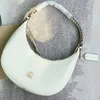 Borse a tracolla 2023 Nuova borsa di design Ascella intrecciata in pelle AVA monospalla da donna Vecchia mezzaluna di fiori