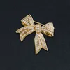 Trendy gouden kleur boogbroches voor vrouwen bruiloft sieraden jurk pak corsage pin kleding accessoires verjaardagsfeestje cadeau