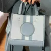 Shoulder Bags 2023 Designer New Female Dempsey 22 Portable Tote Chambray field round cake shopping bag