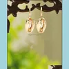 Dangle Lustre Shell Boucles d'oreilles Simple Pendentif Alliage Naturel Longue Section Mode Créative Femme Bijoux National Vent Élégant G Dh1Ye