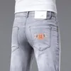 Light Luxury European Fashion Mens Jeans Stretch Casual Slim Fit Pantalones flacos Impreso Primavera y Verano Nuevo