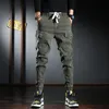 Heren jeans streetwear mode plus maat 2842 multi -zakken casual vrachtbroek hombre hiphop joggers overalls losse broek 230113