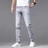 Light Luxury European Fashion Mens Jeans Stretch Casual Slim Fit Pantalones flacos Impreso Primavera y Verano Nuevo