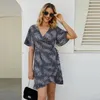 Festklänningar sommar mode leopard tryck fransk kvinnors korta ärm klänning hög midja v-ringning strand semester sexig mini kjol sol