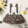 Abiti da ragazza Bambino Neonate Abito Pagliaccetto Pannello con stampa leopardata Manica con volant Backless Estate Infantile Moda Gonna torta con fiocco