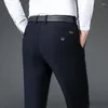 Pantaloni da uomo Completi da lavoro Uomo Nero Blu Classico Dritto Allentato Vita alta Pantaloni da ufficio elastici da ufficio Abbigliamento maschile di marca Taglie forti