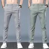 Мужские брюки 2023 Летние мужские случайные растягивающие растяжения тонкие корейские стройные деловые брюки дышащие и для толстых мужчин