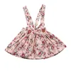 Meisje jurken babymeisjes kleren Kinderen Bib riem riem jurk feest prinses zomers bloemen zonsondergooid schattige mouwloze bowknot strandvestidos