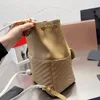 Catene Chiusura con cordino Zaino da donna Borsa a mano Borsa a mano alla moda Lettere hardware in metallo Cinturino regolabile Tasca con patta trapuntata di grande capacità