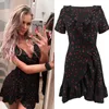 Vestidos casuais mulheres vestido boho summer polka pontas de manga curta de caça curta vil de feriado de férias de férias