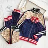 Enfants Vêtements Ensembles Garçons Filles Designer Survêtements Nouveau Luxe Mode g Imprimé Lettre Vestes Pantalons Costumes Joggers Casual Sport Sweat Jeunes Enfants 80jE #