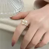 Eheringe 2023 Super Fairy Lily Micro-verkrustete Zirkonblüte Ring weibliche Nische High-End Open, verstellbarer eleganter Frauenschmuck