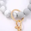 Keychains Silicone Bead Armband Keychain Female European och American Keyring Tassel Wood Food Grade KeychainKeychains