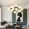 Lampy wiszące złotą czarną lampę Nordic 25/45 główki LED żyrandole zawiesina światło przezroczyste szkło do sypialni salonu