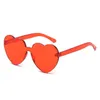 Solglasögon högkvalitativ hjärtform Rimless Transparent Candy Color Frameless Glasses Love Eyewear Party Favor UV400