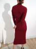 Sıradan elbiseler Camkemsey kadınlar kış sıcak kazak elbisesi 2023 fransız bükülme düğümü çapraz v boynu şık dökülmüş örgü uzun