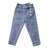 Jeans ragazze coreano Styke 2023 autunno bambina ragazza pantaloni slim in denim solido moda autunno pantaloni con bottoni per bambini