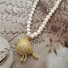 Choker Chokers Elegant Light Luxury Bird Micro Inlaid Zircon Pendant Freshwater Pearl Short Neckochokokers