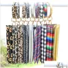 Bolsas de cosméticos puxame de chave de chave de chave de chavel de pulsação de êmbolo feminina pendente de couro de leopardo de girassol saco de girassol saco entrega de gotas de gotas cura dhs17