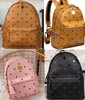 Mam bolsas de couro masculinas e femininas mochila escolar famosa impressão rebite mochila designer senhora bolsas menino e menina mochila