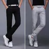 Erkekler Pantolon Orta Rise Fermuar Düğmesi İş Pantolonları Sonbahar Çok Cepler Erkekler Düz Renk Düz Uyum