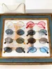 Dames zonnebril voor vrouwen Men Sun bril Mens Fashion Style Beschermt ogen UV400 -lens met willekeurige doos en case 2027
