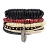 Braccialetti con ciondoli 4 pezzi / set Boho Hippie Punk Cordoncino nero Nodi Pelle Foglia Rivetto Rosso Beige Perline di legno Strati impilati Largo per ManCharm