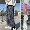 Herenbroek mannen casual elastische taille midden stijgen los rechte wide been streetwear zakken cartoon print mannelijke lange broek bodems