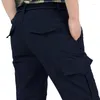 Calça masculina Homens de inverno Tactical à prova d'água Cargo do exército militar Militar de casca mole esticada calça de moletom casual e calças longas quentes