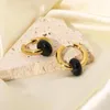 Boucles d'oreilles créoles 2023 arrivée 18k plaqué or en acier inoxydable bijoux de fête pierre noire pendentif Huggie pour les femmes