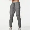 Pantalones para hombre, pantalones deportivos informales de primavera para hombre, pantalones para correr con cordón, cintura holgada, pantalones de ejercicio con bolsillos a juego