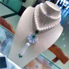 Chaînes nouées à la main longue naturelle 8-9mm blanc perle d'eau douce gland chandail chaîne collier bijoux de mode