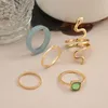 Ringos de cluster Cute Cnera Gold Color Snake para mulheres Trendy Green Crystal Stone Ring Moda Bohemian Jóias GiftScluster