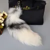 Nyckelringar 40 cm charm härlig hänge päls nyckelring fluffig svanshandväska tillbehör Keyring smycken gåva länge