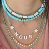 Collier ras du cou Boho en hématite, perles d'espacement colorées en argile polymère pour femmes, bijoux de plage faits à la main