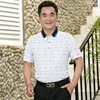 Polos mężczyzn 2023 Polo Hombre Summer Summer Short-Sleeved Shirt Shird Starka Lapel Lattice Ojciec Załadowany mężczyzna