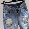 Jeans femininos 2023 Cantura alta calça Hole Hole Feminino Lavado Denim Casual Trouserswomen's